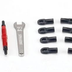 Traxxas Toe links, Slayer (Tubes 7075-T6 aluminum, red) (74mm, fits front or rear) (2)/ rod ends, rear (4)/ rod ends, front (4)/ wrench (1)